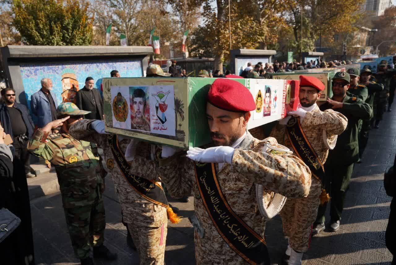 تشییع پیکر مطهر ۹ شهید همزمان با ایام فاطمیه تشییع پیکر مطهر ۹ شهید همزمان با ایام فاطمیه